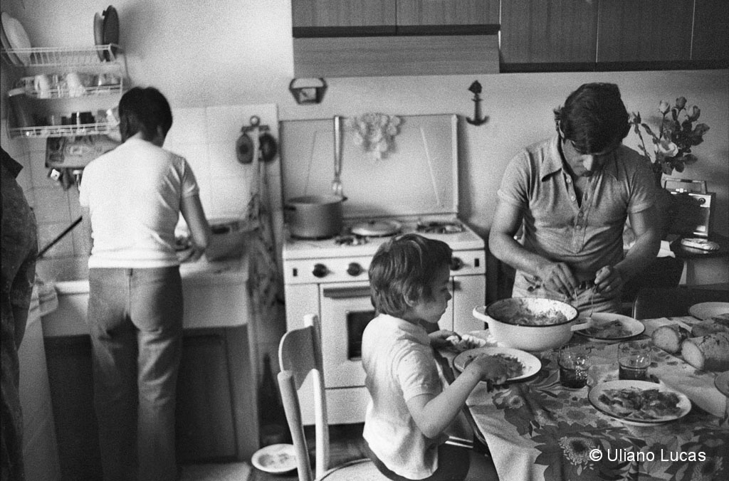 Sunday lunch in the house of an immigrant family, workers in the Milan hinterland, Rho,  June 1975