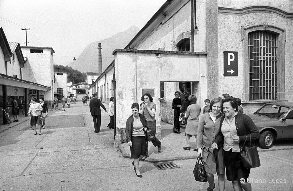 The exit of workers from the woolen mill Rivetti, Val Brembana (Bergamo), 1973