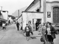 The exit of workers from the woolen mill Rivetti, Val Brembana (Bergamo), 1973