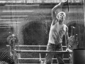 Window cleaner at Campari palace of Turati road, Milan, 1990