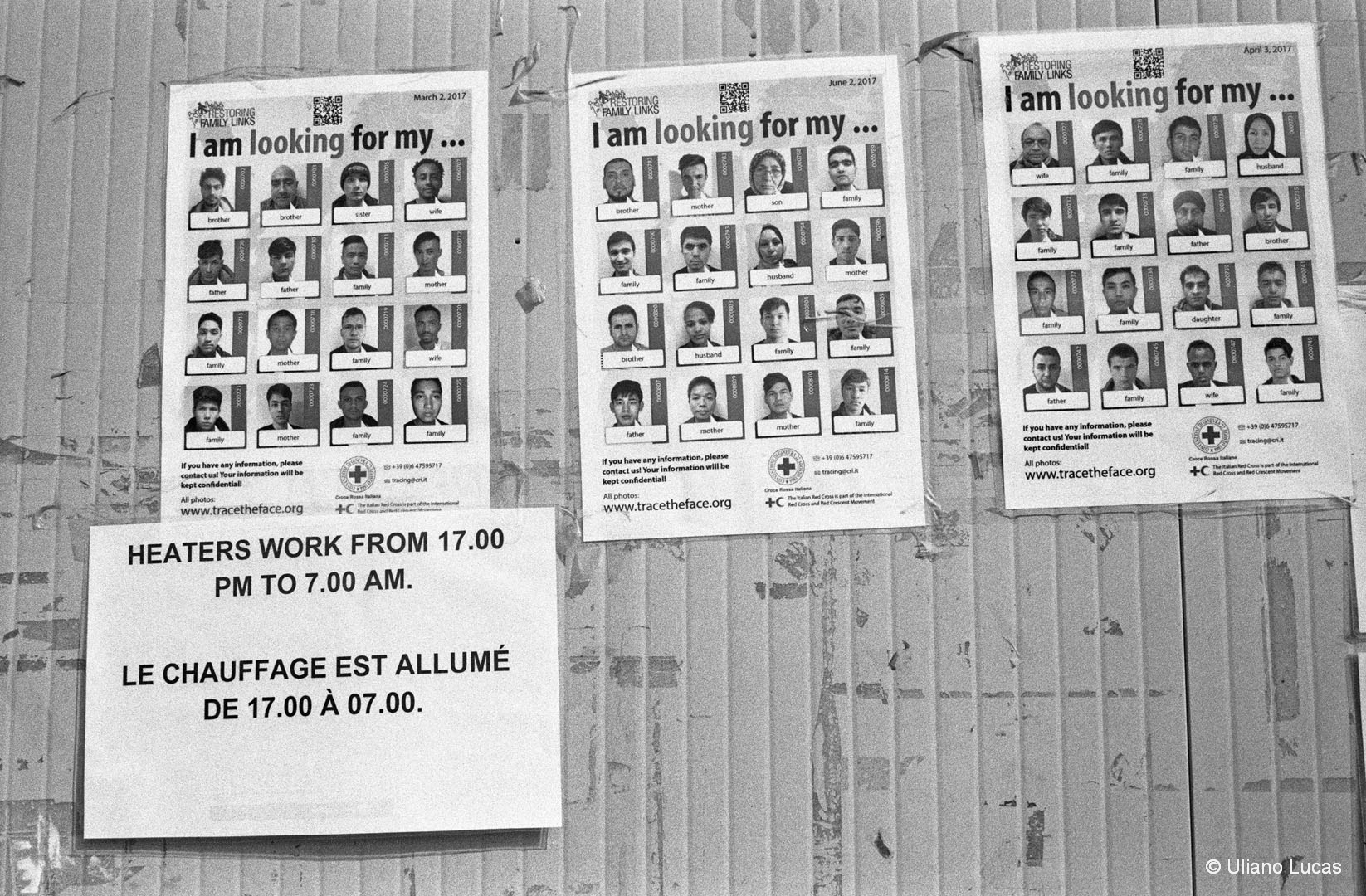 Nel Centro Fenoglio manifesti della Croce Rossa con le foto di persone in cerca dei loro familiari dispersi durante il viaggio verso l'Europa, Settimo, 2017