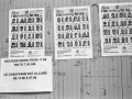 Nel Centro Fenoglio manifesti della Croce Rossa con le foto di persone in cerca dei loro familiari dispersi durante il viaggio verso l'Europa, Settimo, 2017